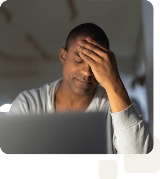 frustrated adult son on computer