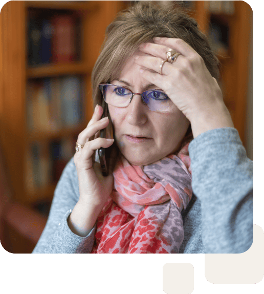 frustrated caregiver on phone