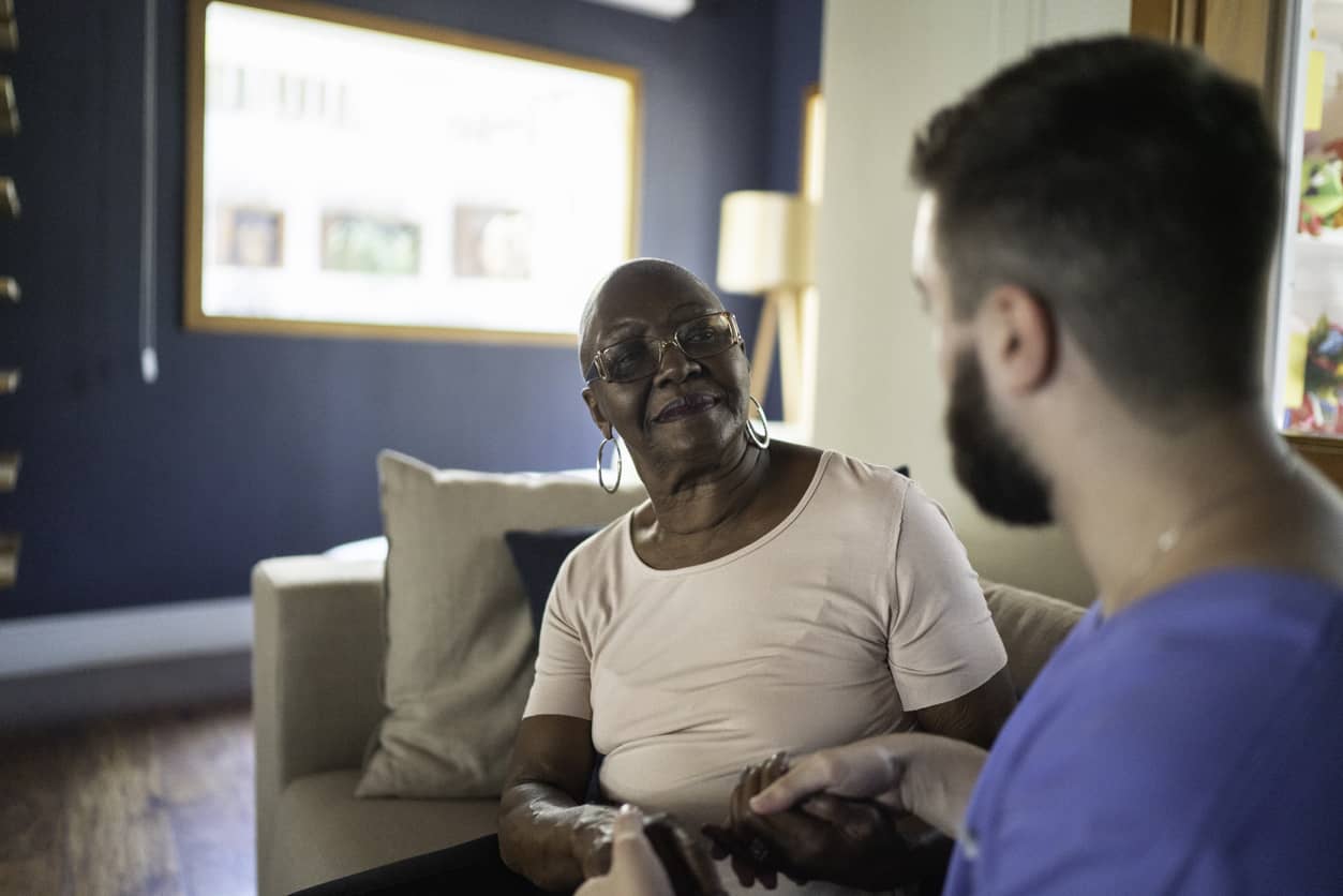 caregiver talking with client